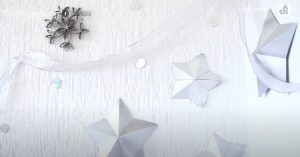 estrellas navideñas y copos brillantes para pared